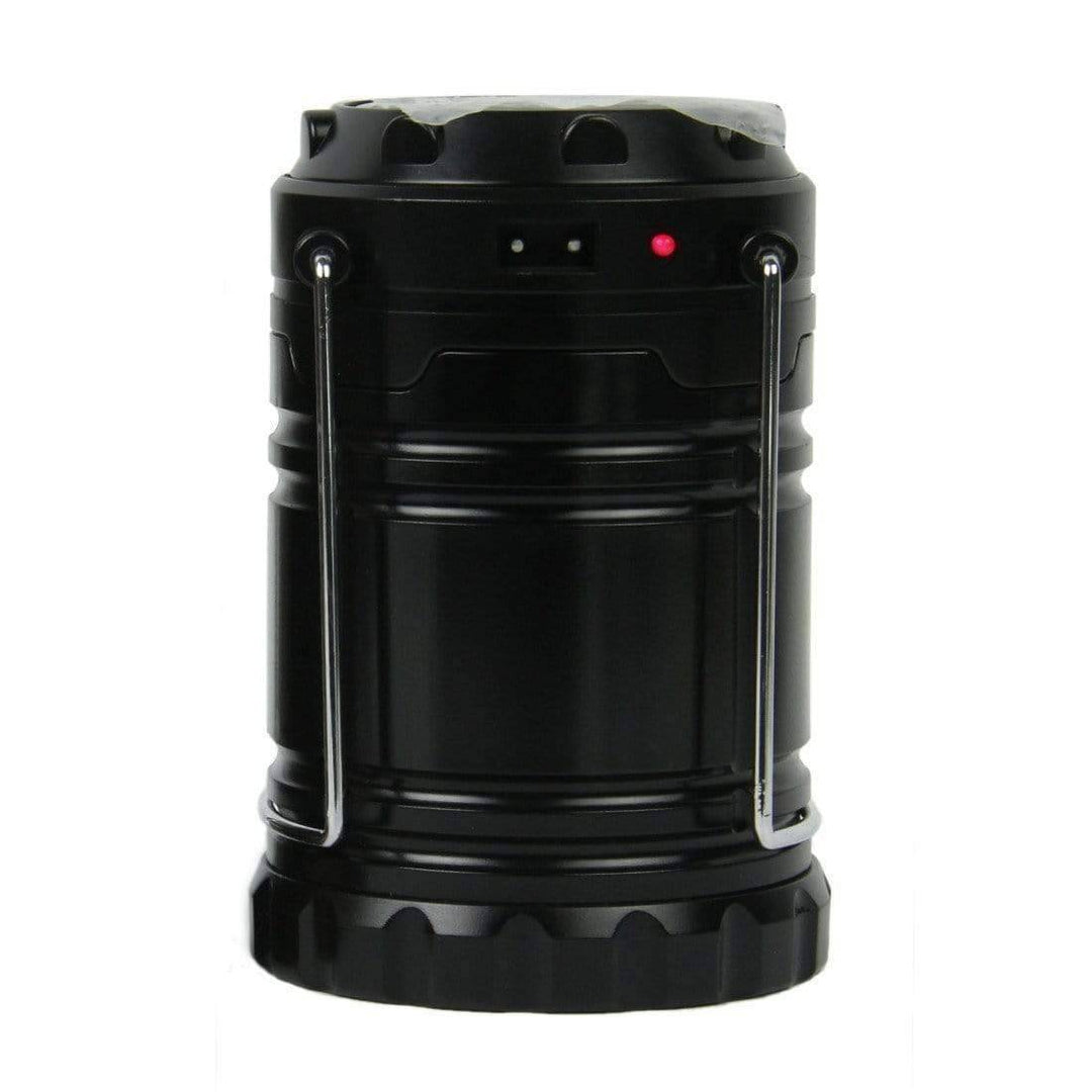 Portable LED lantern, collapsed with top handle, showing solar panel, practical camping gear.