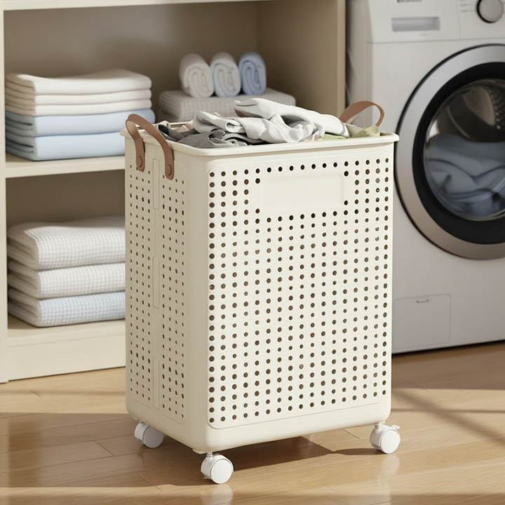 Collapsible rolling laundry hamper in cream for easy transport of clothes. Ideal for space-saving home organization.