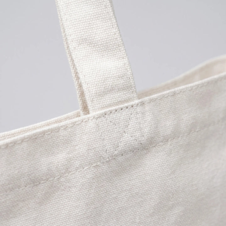 Versatile foldable printed tote bag for women, perfect as a casual shoulder bag or everyday carry.