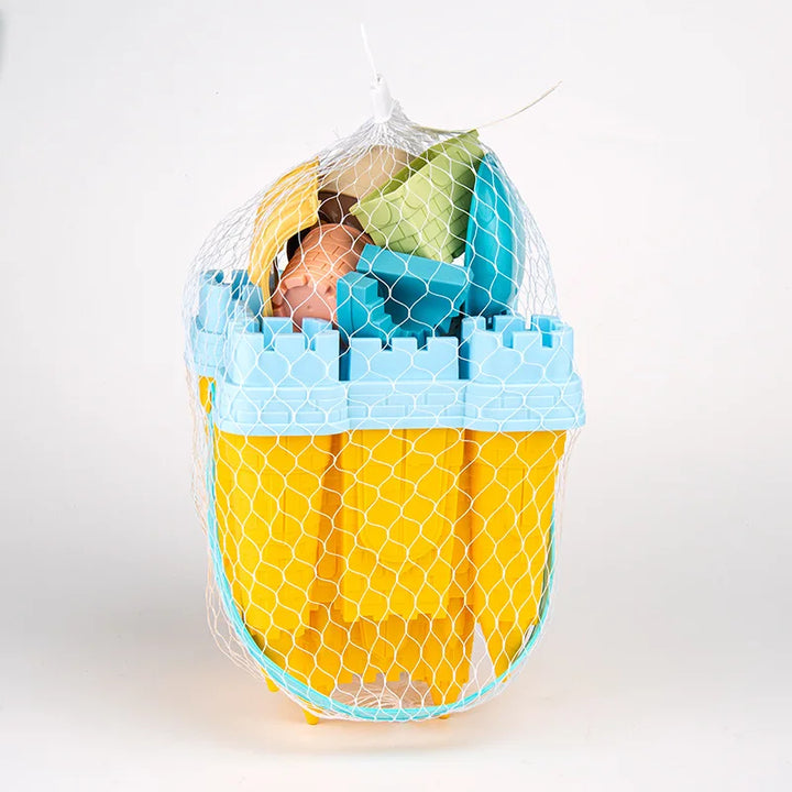 Kids playing happily with an endless sandcastle playset on a sunny beach. Ideal creative summer fun & outdoor activity toy.
