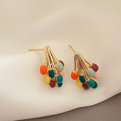 Playful women's balloon cluster stud earrings. Colorful enamel & gold-tone finish. Trendy fashion accessory.