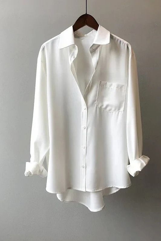 Elegant women's flowy blouse for day to night wear. Comfortable and versatile casual top with relaxed fit.