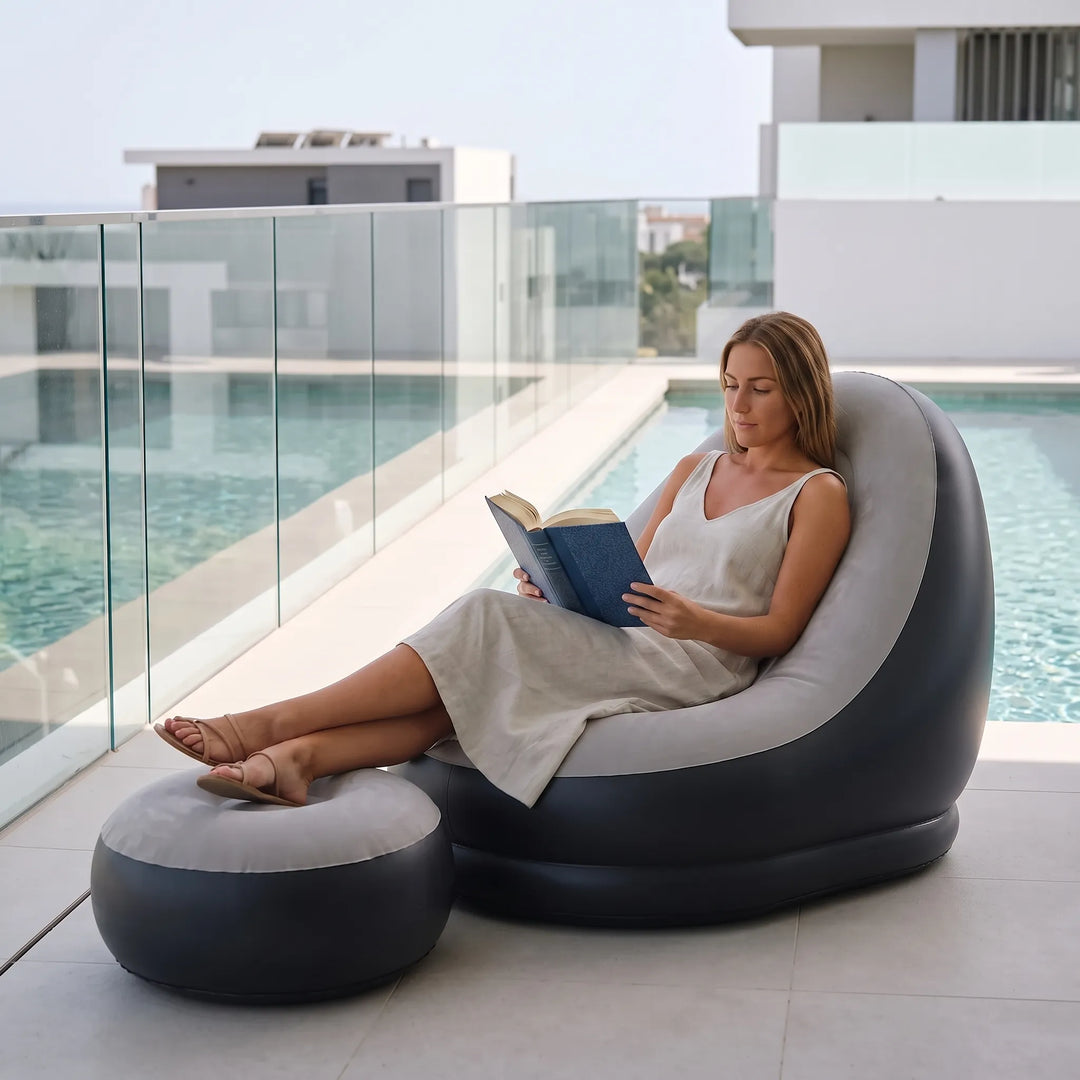 Comfortable inflatable lounge chair with footrest, perfect for indoor & outdoor relaxation.