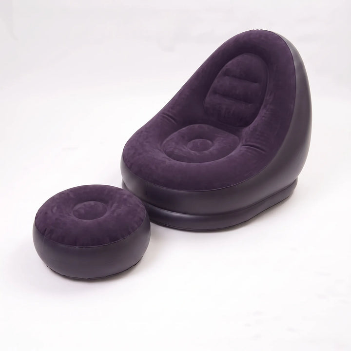 Ultra-comfortable inflatable lounge chair with matching footrest for relaxing home comfort.