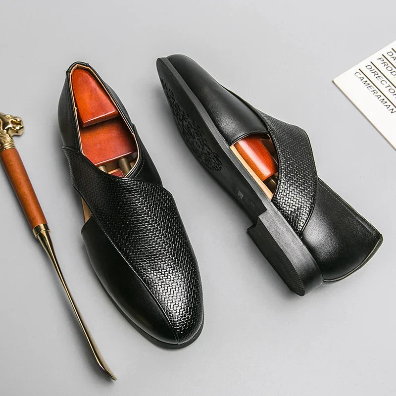 Sleek men's slip-on loafers, showcasing a minimalist design for sophisticated wear.