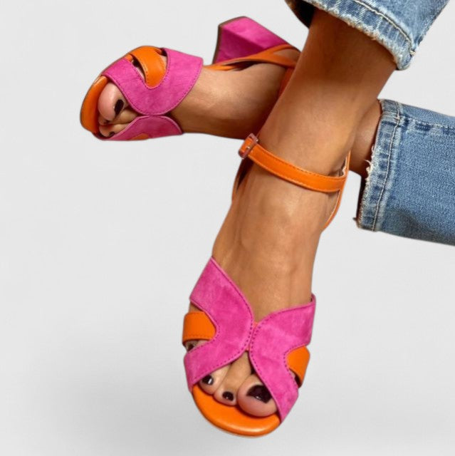 Elegant pink strappy wedge sandals for women, offering comfortable and stylish summer casual footwear.