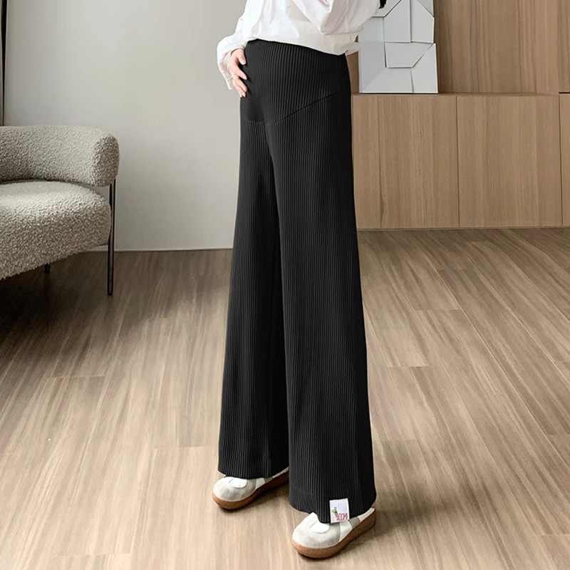 Women's comfortable maternity wide leg pants, high-waisted with stretch for elegant pregnancy wear.