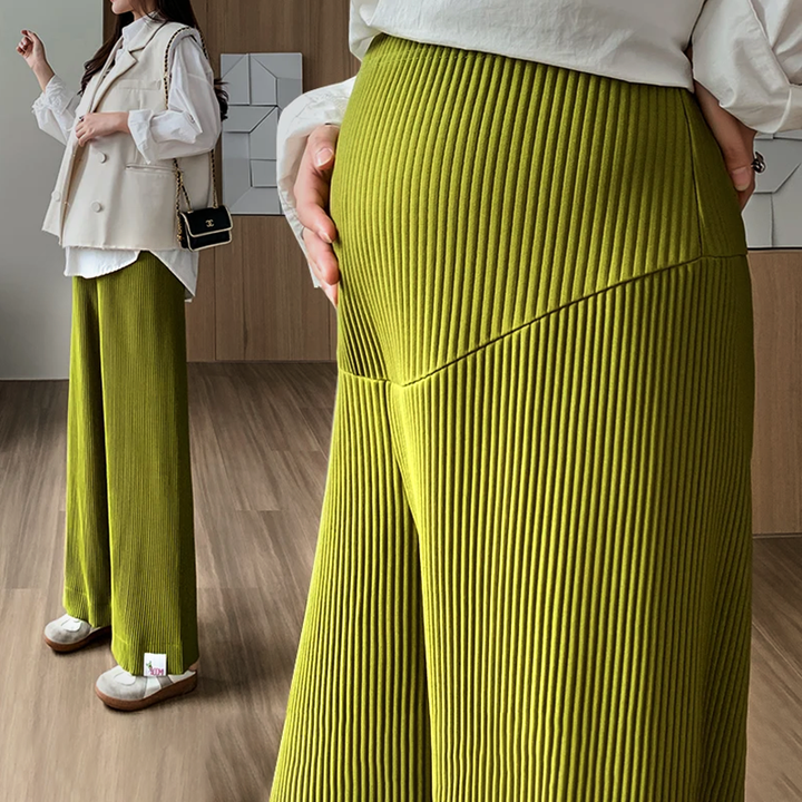 Elegant wide leg maternity pants, high-waisted & stretchy for women's comfortable pregnancy style.