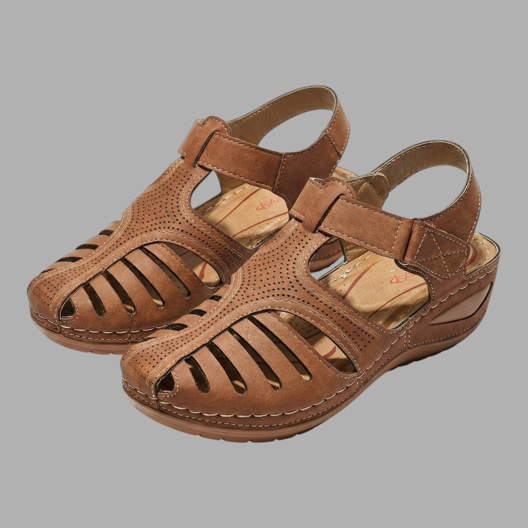 Beige women's open-toe wedge sandals with breathable straps, offering comfortable and elegant summer style.