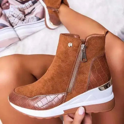 Side profile: Women's mid-top sneakers, highlighting stylish design, arch support & zipper closure.