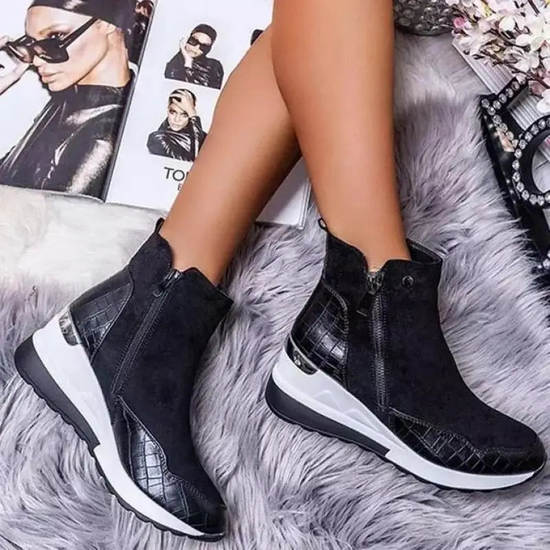 Zipper closure detail on women's mid-top sneakers, providing easy access and stylish comfort.