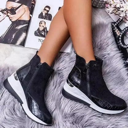 Zipper closure detail on women's mid-top sneakers, providing easy access and stylish comfort.