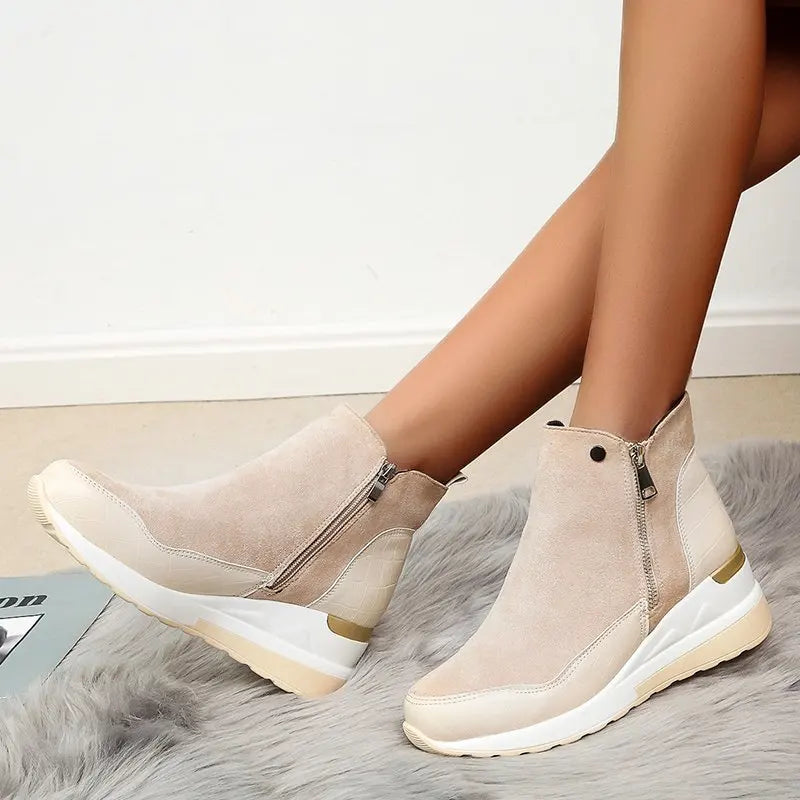 Stylish fall/winter women's wedge ankle boots, featuring a convenient side zipper.