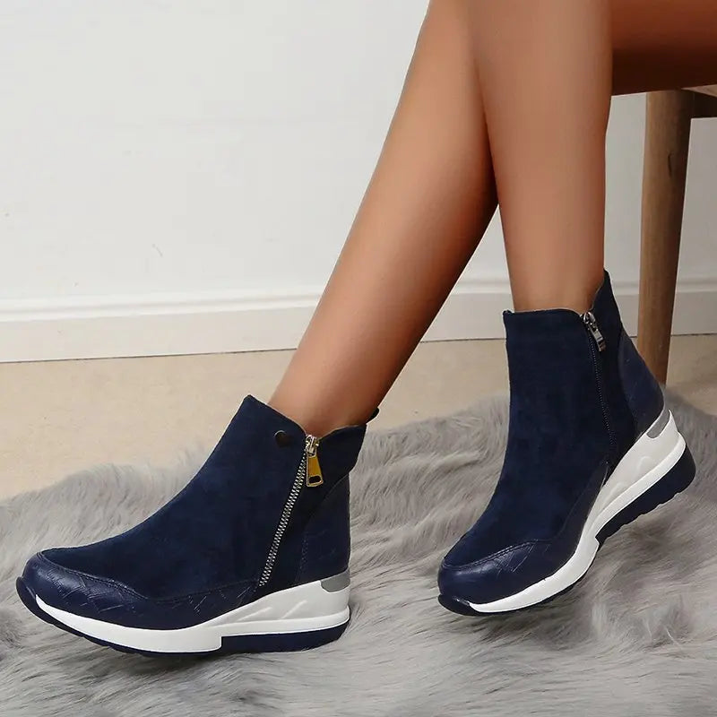 Versatile women's wedge boots, perfect for casual or dressy outfits and all-day comfort.