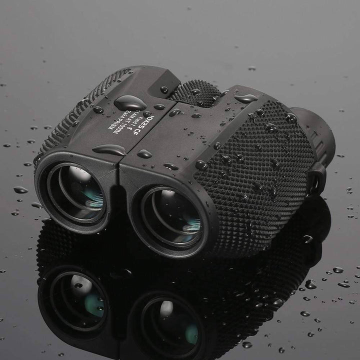 Compact 10x25 high power binoculars for outdoor adventures, showing front lens view