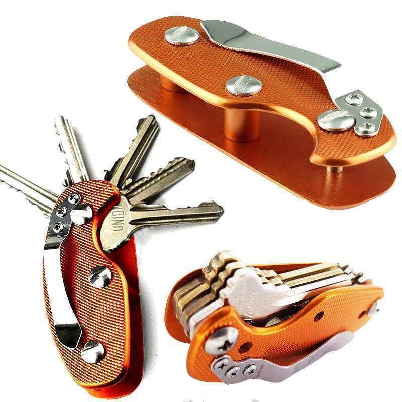 Compact aluminum EDC keychain organizer, lightweight folding design, black finish, holding multiple keys.