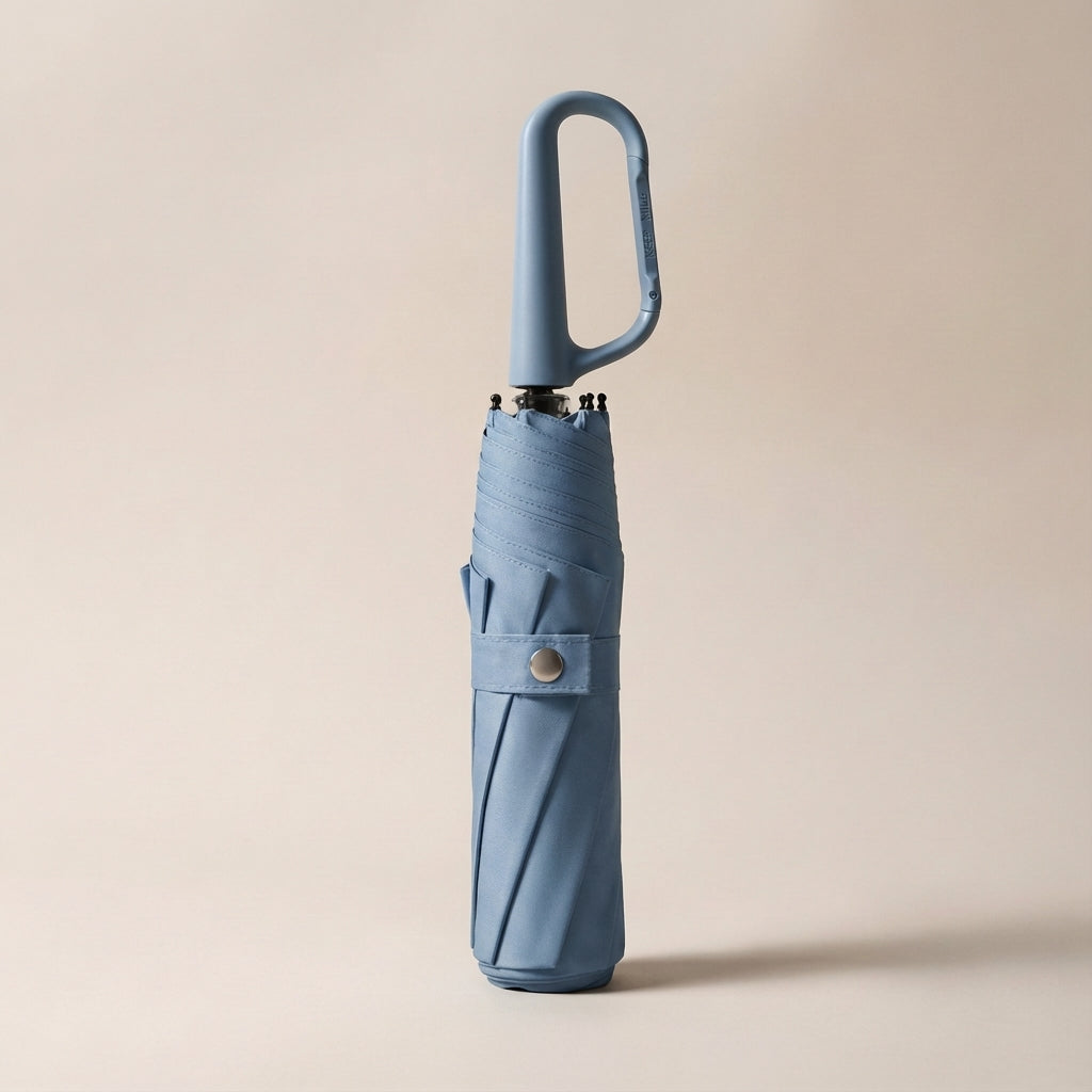 All-weather durable umbrella, designed as a compact, foldable, and clip-on solution for commuters.