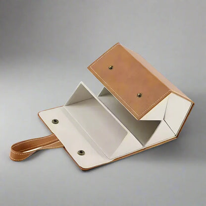 Multi-slot brown leather glasses organizer, a stylish and secure way to store several pairs of eyewear.