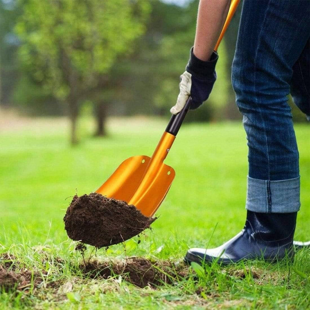 Compact carbon steel shovel for camping, gardening, and survival, showing portable design and durable build.