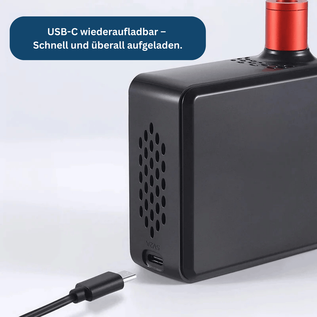 Portable mini air compressor inflating a car tire, highlighting its compact size and easy use.