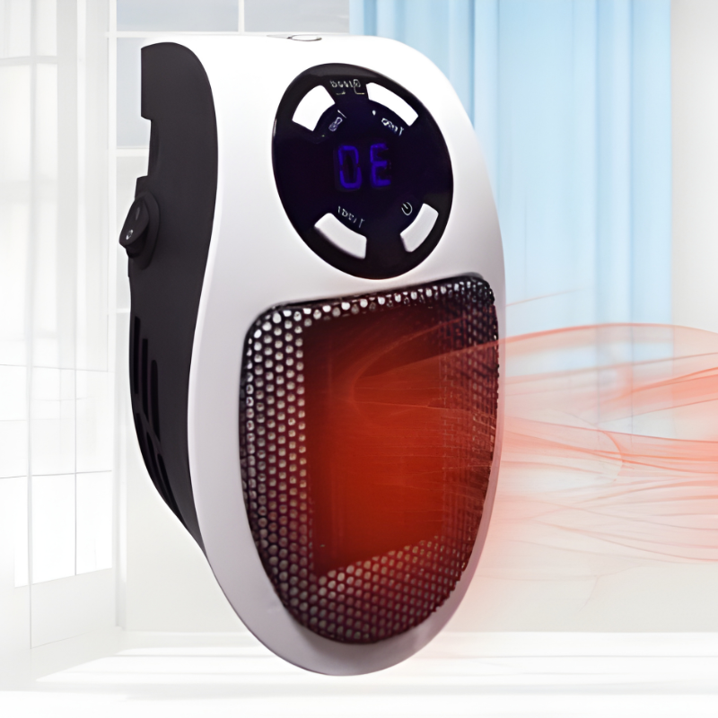 Compact electric space heater, black, for personal warmth. Ideal portable mini heater for home or office desks.