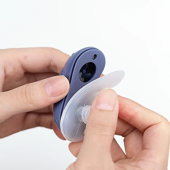 Ergonomic, compact micro CPAP for sleep apnea therapy. Rechargeable, comfortable, and silent personal health device.