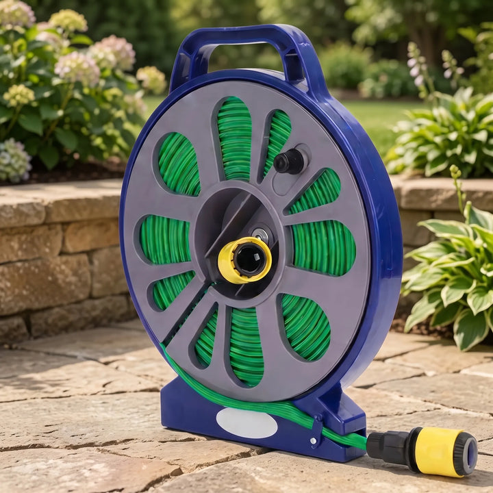 Compact portable garden hose reel with handle and quick connect for easy outdoor watering and lawn care.