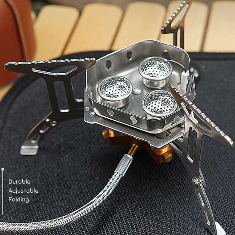Lightweight propane camping stove with adjustable flame, essential outdoor cooking gear for travellers.