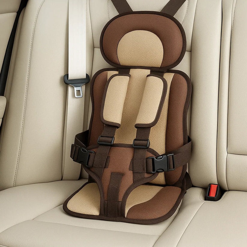 Toddler portable booster seat, grey fabric, compact for travel, ensuring safety & comfort for kids.