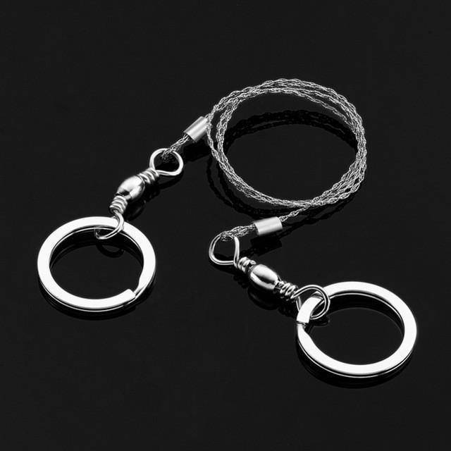 Portable tactical wire saw in stainless steel, perfect for outdoor emergency kit