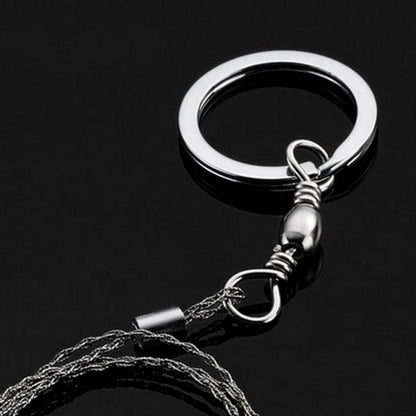 Survival wire saw, gleaming stainless steel, ready for tactical outdoor use