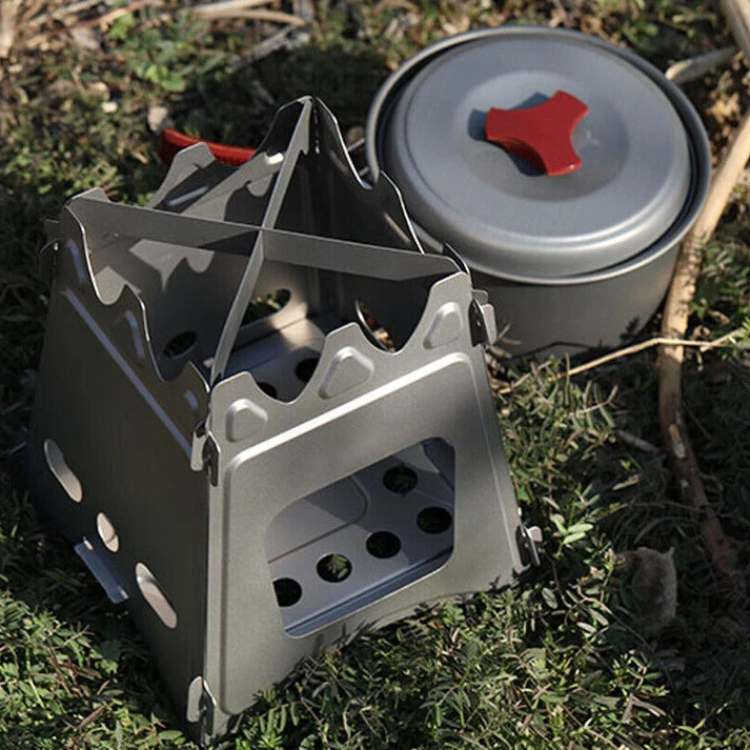 Collapsible wood burning camping stove assembled, ready for outdoor cooking adventures