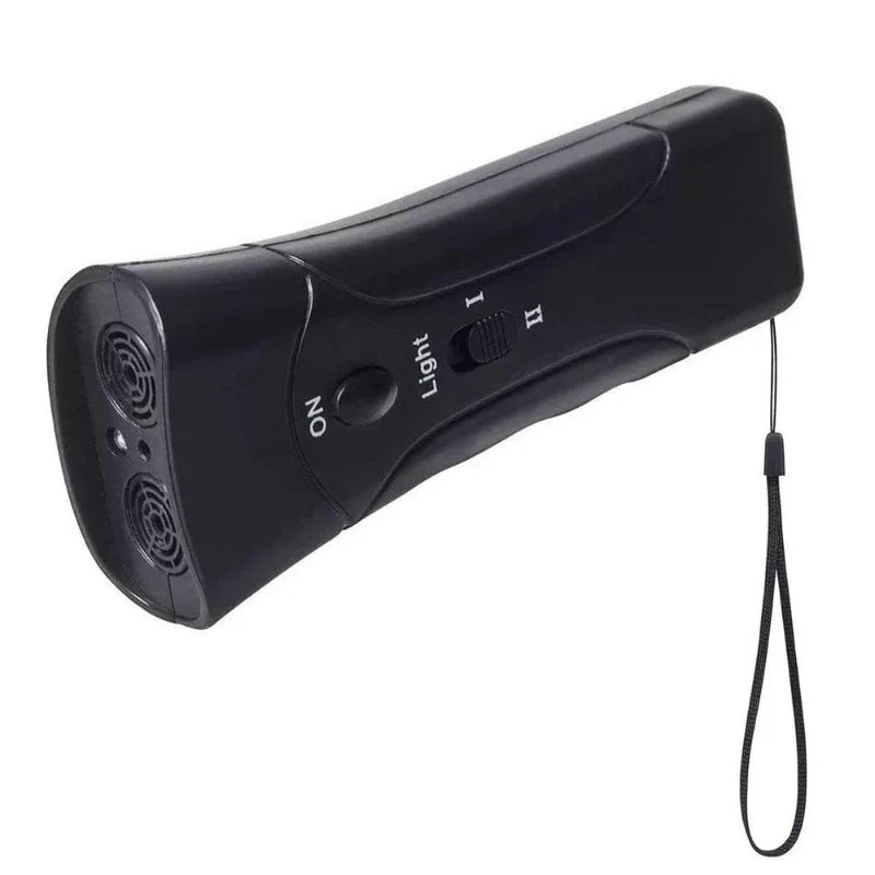 Close-up of ultrasonic anti-barking device with control buttons. Humane dog training & bark control aid.