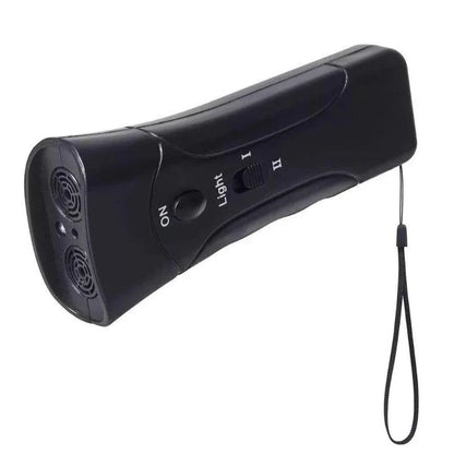 Close-up of ultrasonic anti-barking device with control buttons. Humane dog training & bark control aid.