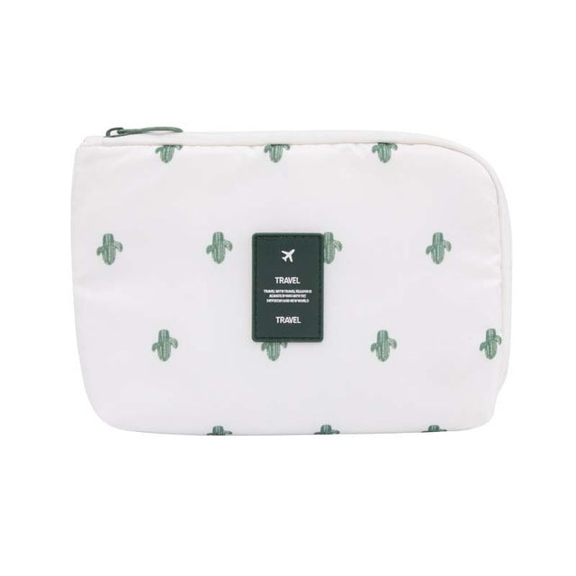 Compact waterproof electronics organizer bag in trendy cactus color for travel essentials.