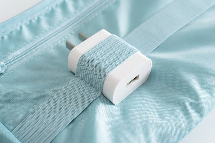 Waterproof travel organizer for cables & gadgets, compact cactus color tech accessory bag.