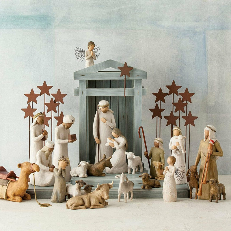 Complete 20-piece Religious Nativity Set, ideal for Christmas spiritual decor. Hand-painted figures and barn wood creche.