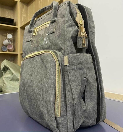 Ergonomic baby diaper backpack, comfortable for parents, featuring a multi-functional changing station.