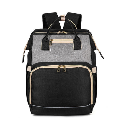 Waterproof convertible diaper bag and travel bassinet, ready for any adventure with your baby gear.