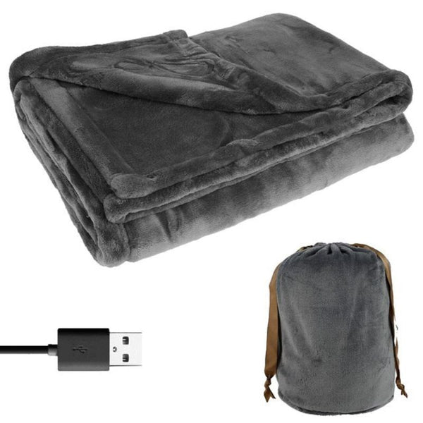 Pink flannel electric heated blanket, cordless & USB powered for comforting warmth at home.