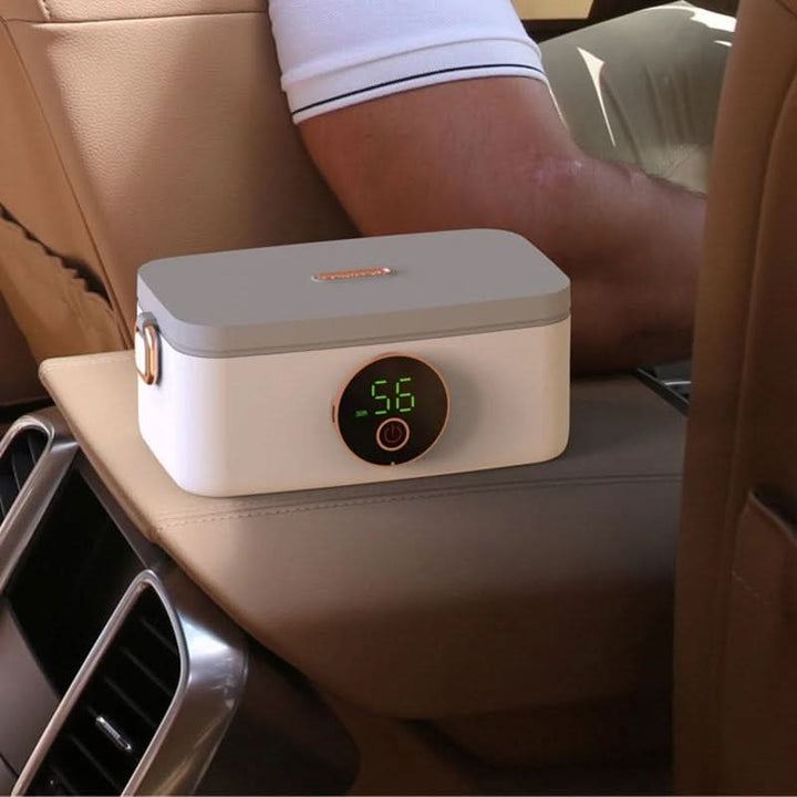 Cordless heated lunchbox with stainless steel interior, perfect for hot meals on-the-go.