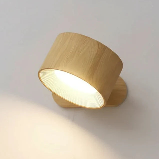 Cordless rotatable LED wall lamp, modern design, perfect for bedroom or task lighting. Rechargeable with touch control.