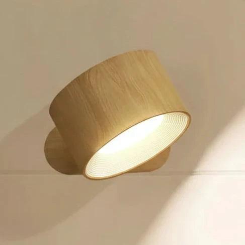 Wireless rotatable LED light fixture, modern wall lamp with touch control. Rechargeable battery for versatile home lighting.