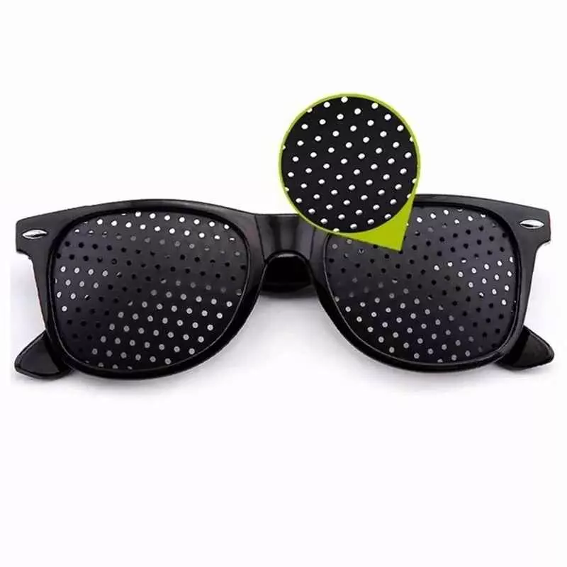 Corrective pinhole glasses designed to improve eye focus and reduce strain for natural vision training.