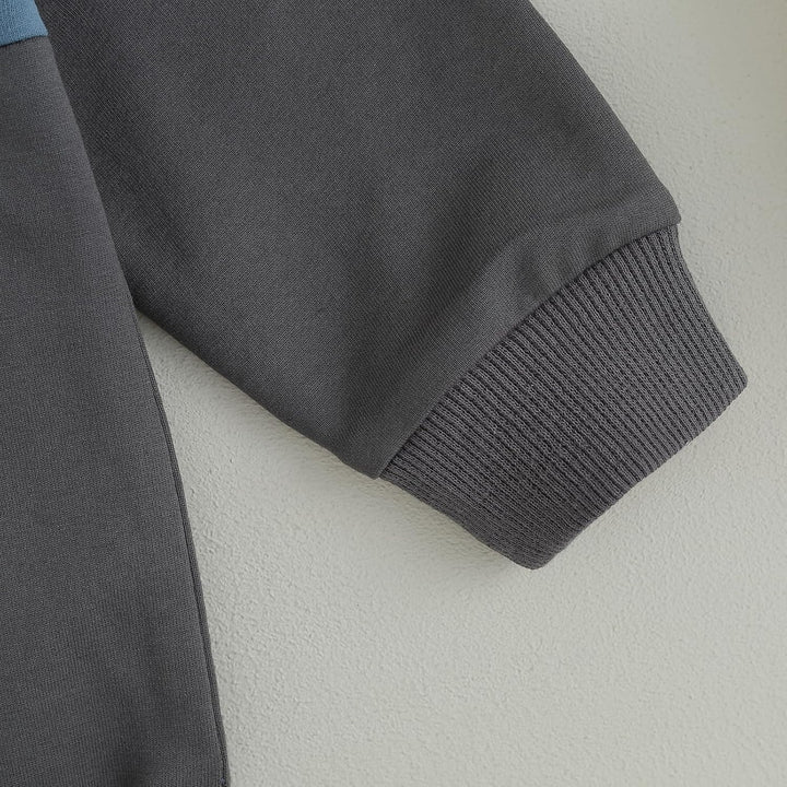 Chic baby winter jogger set, contrast sweatshirt & fashion-forward trousers.