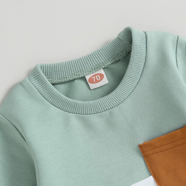 Active baby winter wear: contrast sweatshirt & freedom-of-movement jogger trousers.