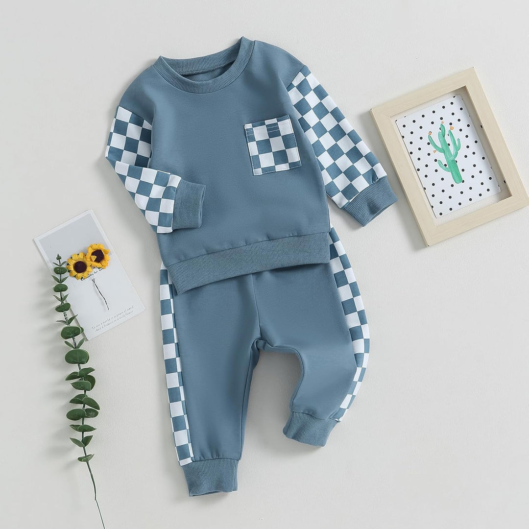 Baby's cozy winter playwear: contrasting sweatshirt & durable jogger bottoms.