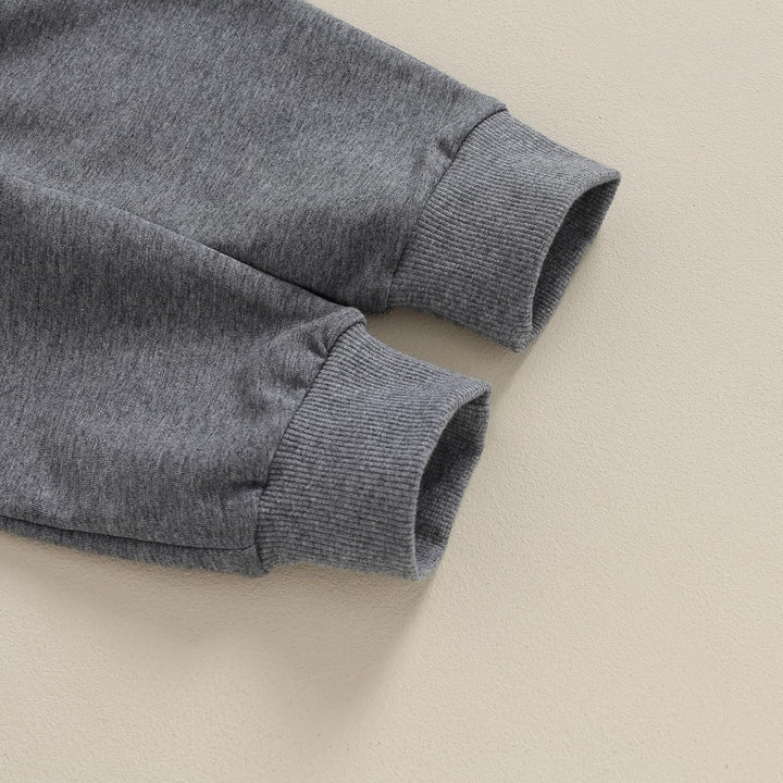 Signature baby winter outfit, contrast sweatshirt & distinctive jogger trousers.