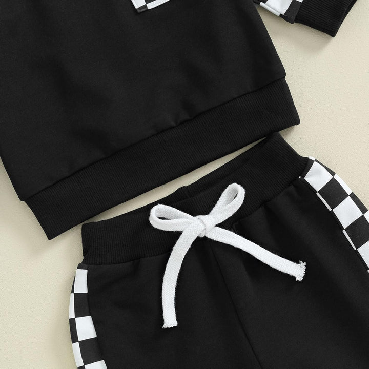 Modern contrast baby winter outfit, sweatshirt & practical jogger pants.