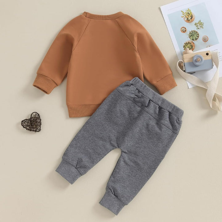 Indoor comfort baby winter jogger: contrast top & snug trousers.